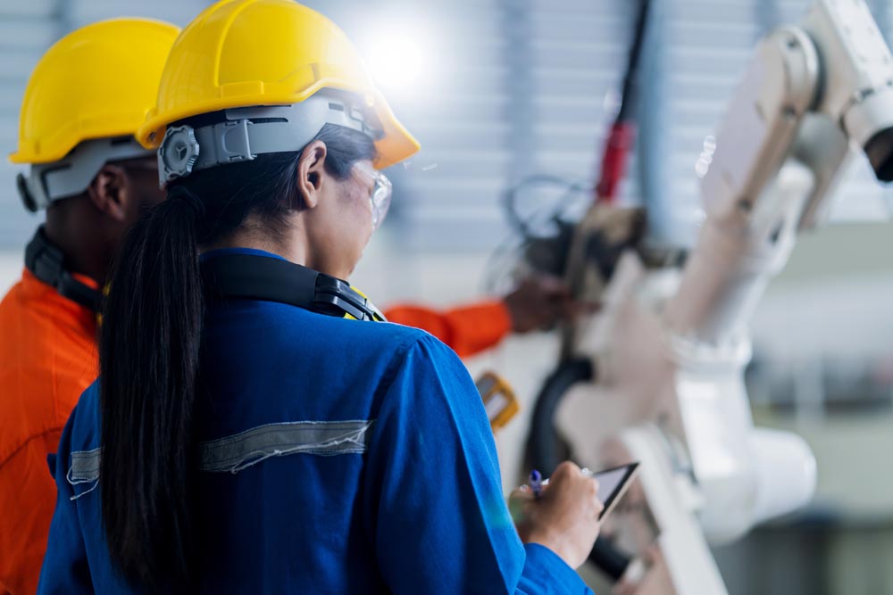 engineer cooperation male and female technician maintenance cont